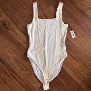 BRAND NEW Sleek White Body Suit